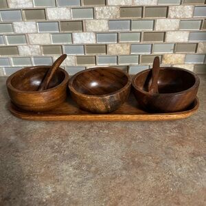 Vintage teak bowl and spoon set on an oval tray